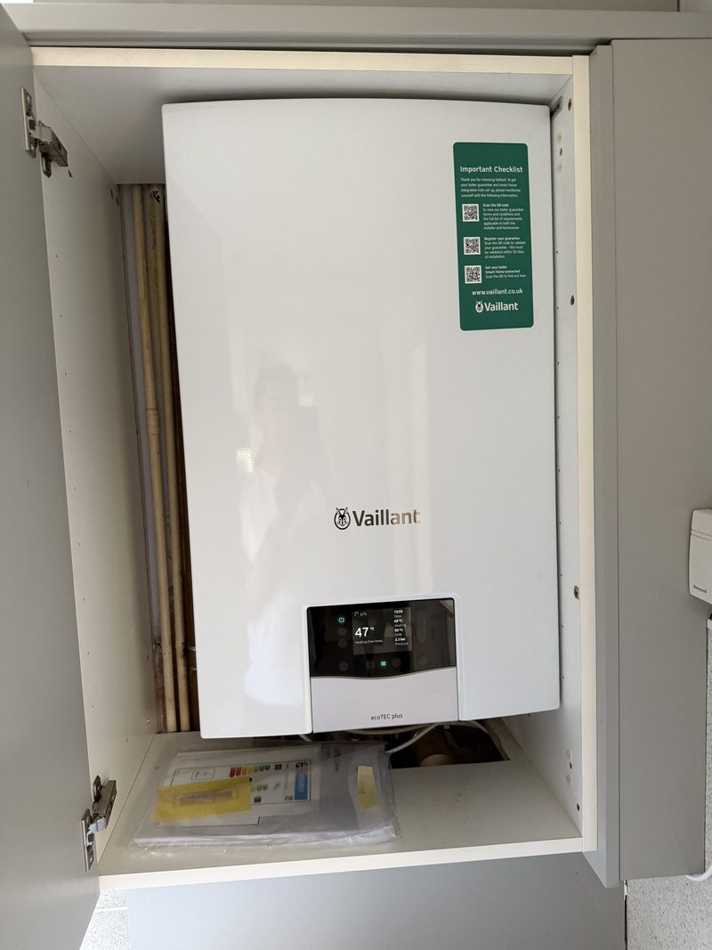 Vaillant boiler fitted inside a wall cabinet