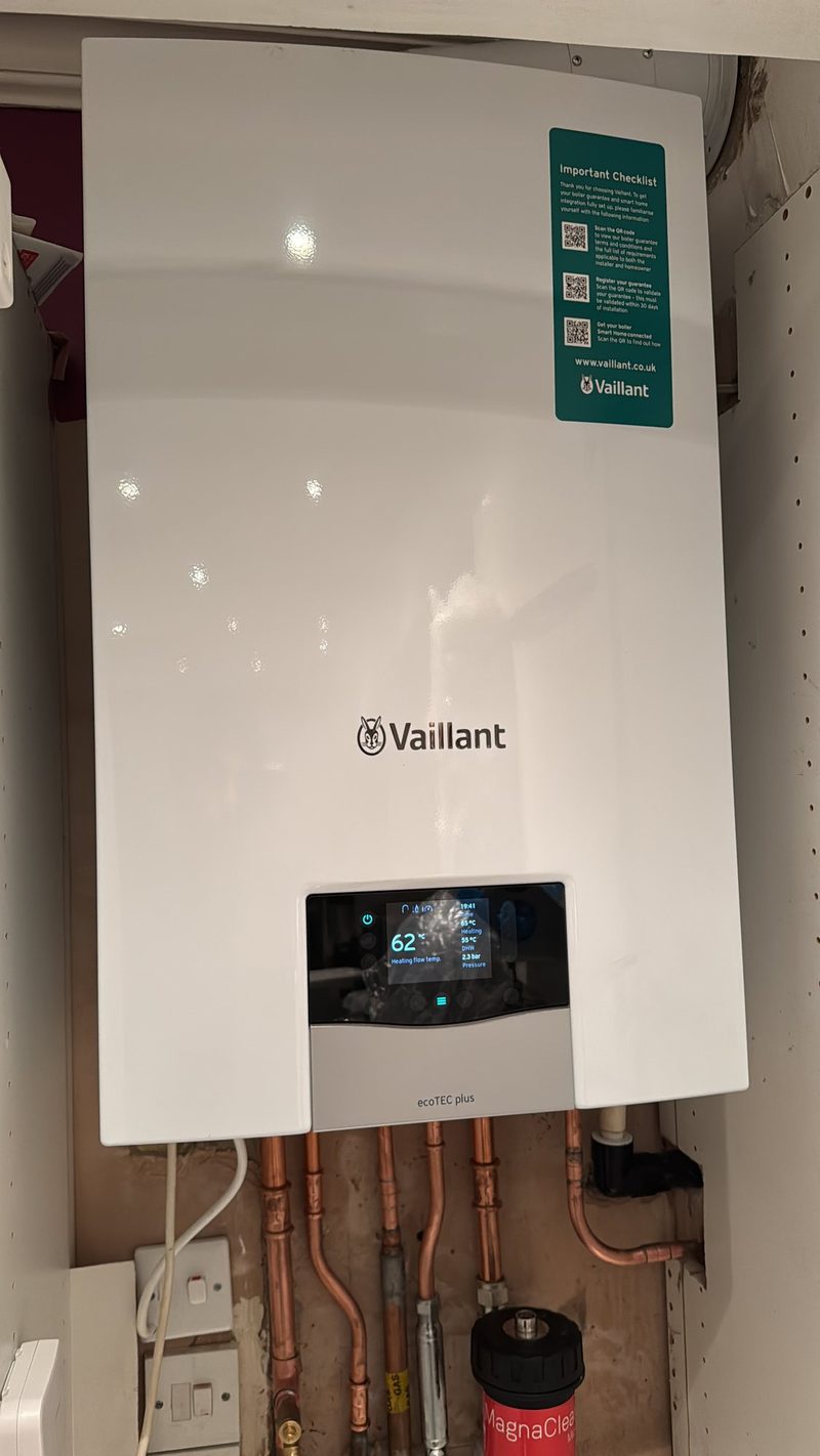 Vaillant boiler fitted in a kitchen cupboard