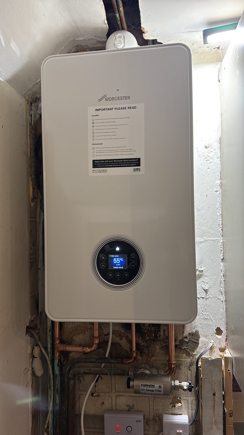Worcester Bosch boiler fitted in a cupboard