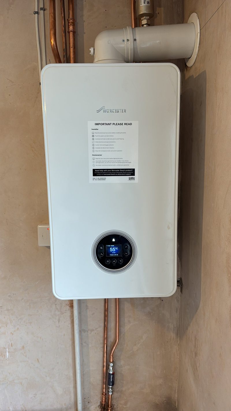 Worcester Bosch boiler with flue pipework
